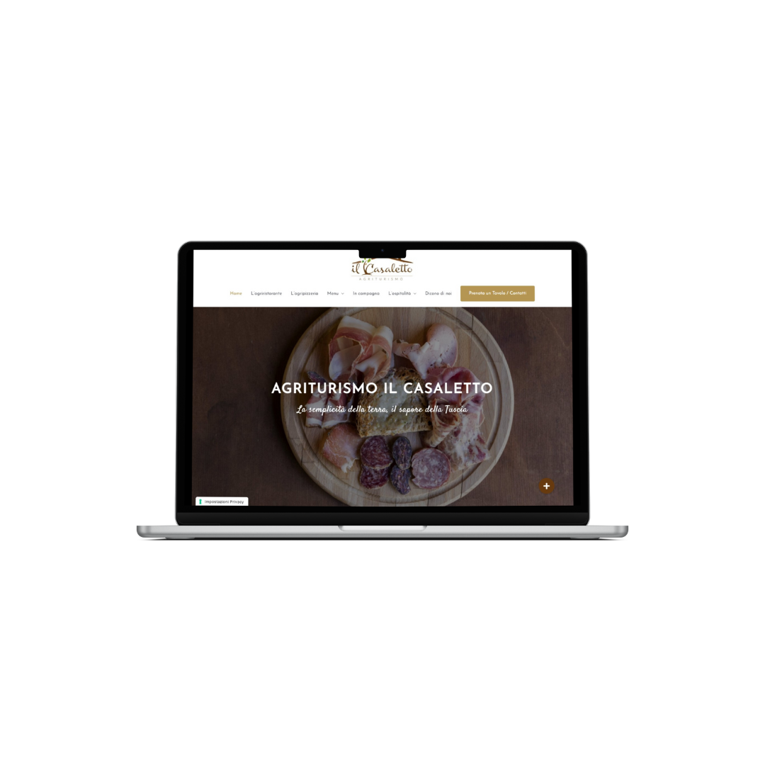 Schermata di un sito web di agriturismo su un laptop.